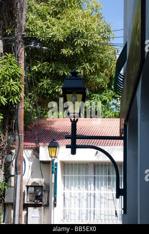 Old lamps and alley Marigot French Saint Martin Stock Photo