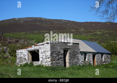 old abandoned remote rural irish farm buildings on Slieve Gullion mountain in the ring of gullion south county armagh Stock Photo