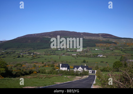 brand new newbuild large home in countryside beneath Slieve Gullion mountain in the ring of gullion south county armagh Stock Photo