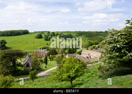 Lasborough Manor and St Marys church in the Cotswold hamlet of Lasborough, Gloucestershire. Stock Photo