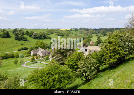 Lasborough Manor and St Marys church in the Cotswold hamlet of Lasborough, Gloucestershire. Stock Photo