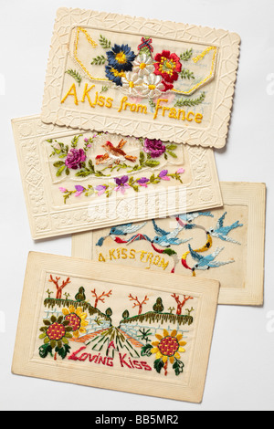 Old silk embroidered Christmas cards from WW1. Stock Photo