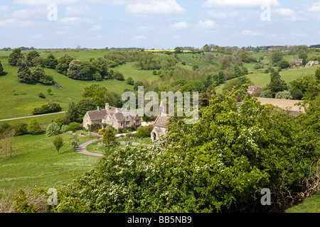 Lasborough Manor and St Marys church in the Cotswold hamlet of Lasborough, Gloucestershire. Stock Photo