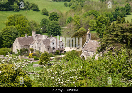 Lasborough Manor and St Marys church in the Cotswold hamlet of Lasborough, Gloucestershire. Stock Photo