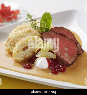 Sirloin of beef with cream sauce and dumplings Stock Photo