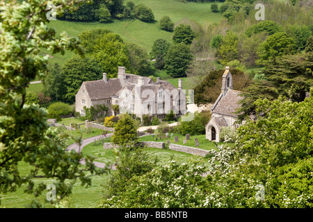 Lasborough Manor and St Marys church in the Cotswold hamlet of Lasborough, Gloucestershire UK. Lark Rise to Candleford location. Stock Photo