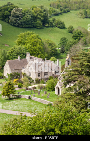 Lasborough Manor and St Marys church in the Cotswold hamlet of Lasborough, Gloucestershire. Stock Photo