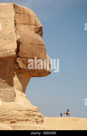 The Sphinx in Profile with camel on a distant hill Stock Photo