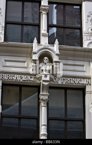 Building facade on Milk Street in Boston Massachusetts commemorating the birthplace of Benjamin Franklin.  Boston Massachusetts. Stock Photo