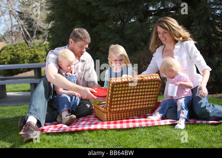 Family having a picnic at the park Stock Photo