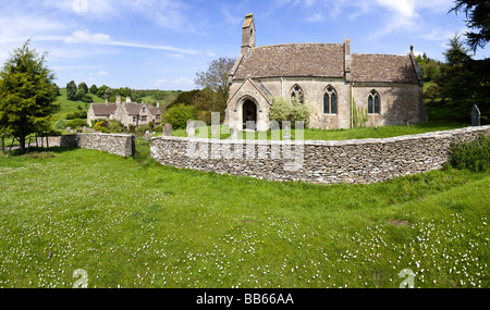 Lasborough Manor and St Marys church in the Cotswold hamlet of Lasborough, Gloucestershire. Stock Photo