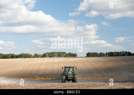 Tractor Spraying Field Stock Photo