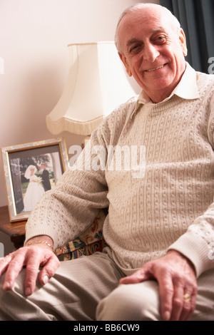 Senior Man Relaxing At Home Stock Photo