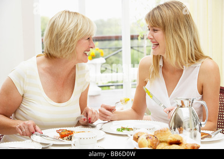 Two Women Enjoying Hotel Breakfast Stock Photo