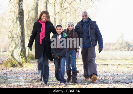 Family On Autumn Walk In Countryside