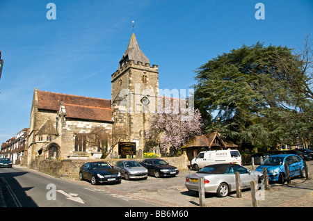 A street scene in Midhurst town in West Sussex St Mary Magdalene and St Denys Church on Church Hill Stock Photo