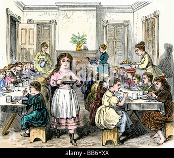 Poor children eating dinner at the Children's Aid Society summer resort in New York 1800s. Hand-colored woodcut Stock Photo