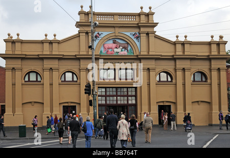 People crossing the road to entrance of Queen Victoria Market Melbourne Australia Stock Photo