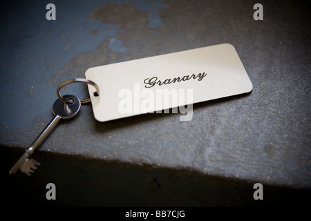 Key left on door step Stock Photo