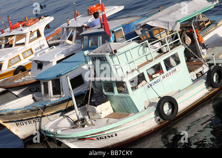 Istanbul Turkey small local fishing boats moored at Kumkapi harbour on the Sea of Marmara Stock Photo
