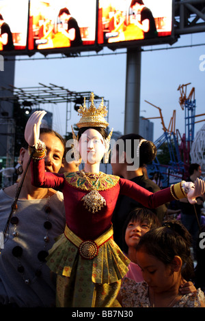 Thai children posing with traditional Thai puppet , Culture festival at Siam Paragon in Bangkok , Thailand Stock Photo