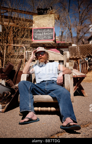 Portrait of contemporary artist Craig Marshall outside his shack in Keeler in California USA Stock Photo