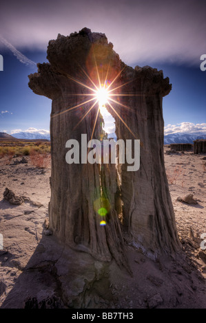 Natural starburst through tufa formations at Navy Beach near Mono Lake in California USA Stock Photo