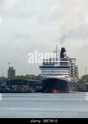 Cunard's Queen Victoria berthing early morning at the new Ocean Terminal in Southampton UK for the first time Stock Photo