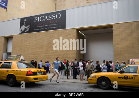 Art lovers wait on enter the Pablo Picasso exhibit at the Gagosian gallery in the trendy gallery district of Chelsea in New York Stock Photo