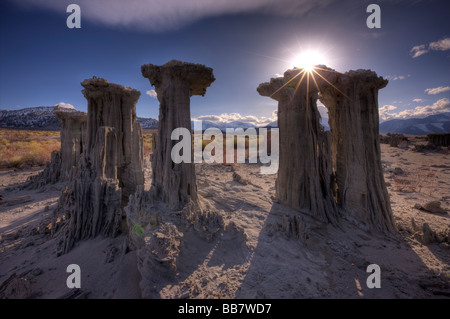 Natural starburst through tufa formations at Navy Beach near Mono Lake in California USA Stock Photo