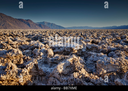 View across salt formations at Devils Golf Course in Death Valley National Park California USA Stock Photo