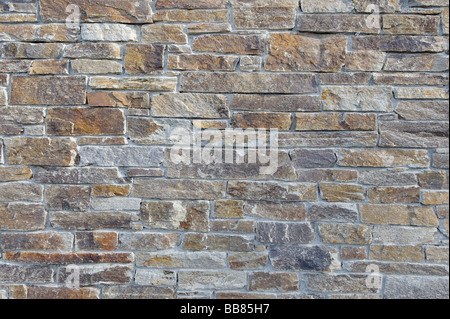 Stone wall, brick facade, gneiss wall Stock Photo