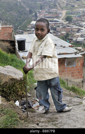 Six year old dark-skinned boy, slums of Alto de Cazuca, Soacha, Bogotá, Columbia Stock Photo