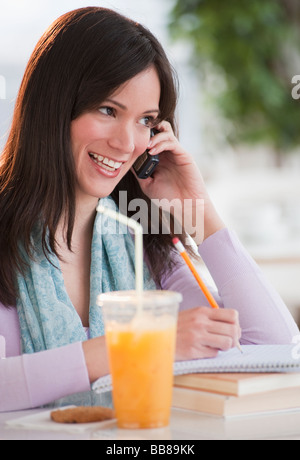 Woman talking on phone Stock Photo