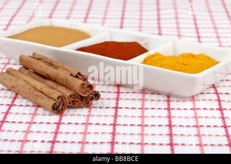 Cinnamon sticks with other spices used in cooking Stock Photo