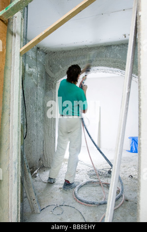 Building site, applying insulation in a cellar Stock Photo