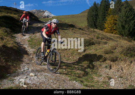 Mountain biker at Mount Gaisberg, Rettenbach, Tyrol, Austria Stock Photo