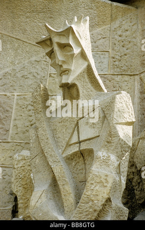 Christ with crown of thorns, modern stone sculpture of the frontage of the Passion, Cathedral La Sagrada Familia, Barcelona, Ca Stock Photo