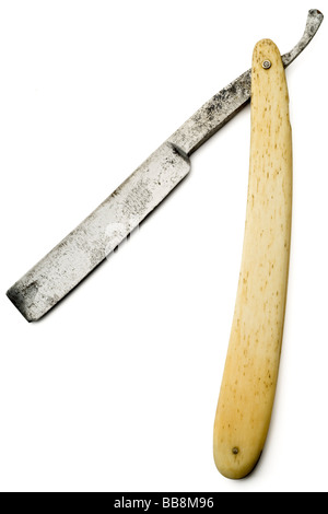 an old rusty razor on white with clipping path Stock Photo