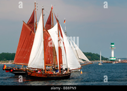 Sailing ships at the windjammer parade of the Kiel Week 2006 with Friedrichsort lighthouse at back, Kiel Fjord, Schleswig-Holst Stock Photo