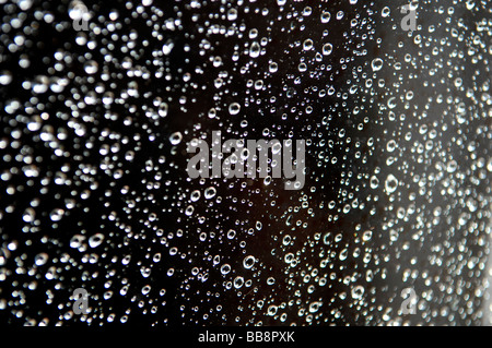 raindrops on a window pane Stock Photo