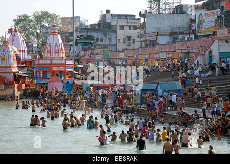 Pilgrims praying and bathing at Har Ki Pairi ghat by the 