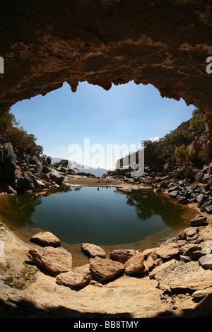 The hidden lake near the deserted village of Sab Bani Khamis in Jebel Shams in Oman Stock Photo