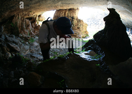 Fresh water in a cave near the deserted village of Sab Bani Khamis in Jebel Shams in Oman Stock Photo