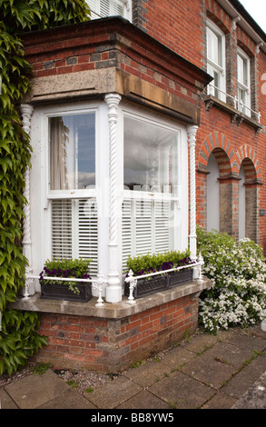 England Berkshire Cookham School Lane barley twist iron columns supporting house front bay window Stock Photo