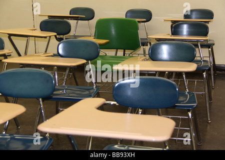 Empty school classroom with desks. Stock Photo