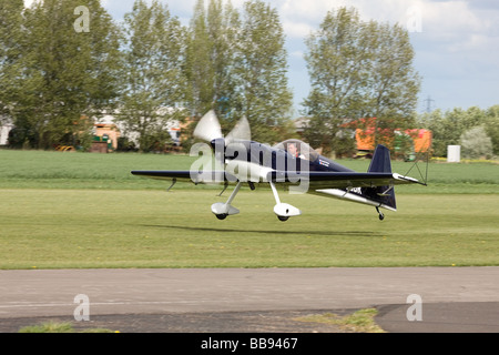 Avions Mundry CAP 232 G-OGBR landing at Breighton Airfield Stock Photo