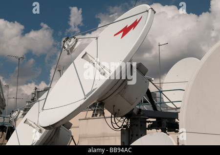 Broadcasting satellite dishes at a satellite Earthstation in London Stock Photo