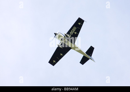 Avions Mundry CAP 232 G-OGBR turning & climbing in flight at Breighton Airfield Stock Photo