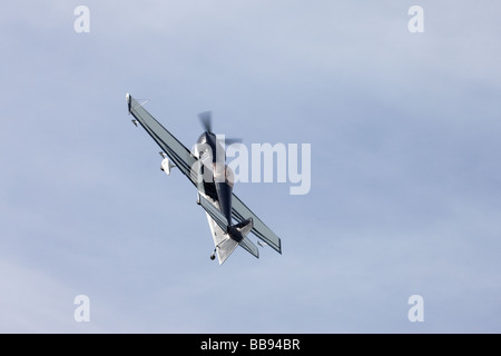 Avions Mundry CAP 232 G-OGBR in flight turning & climbing steeply at Breighton Airfield Stock Photo